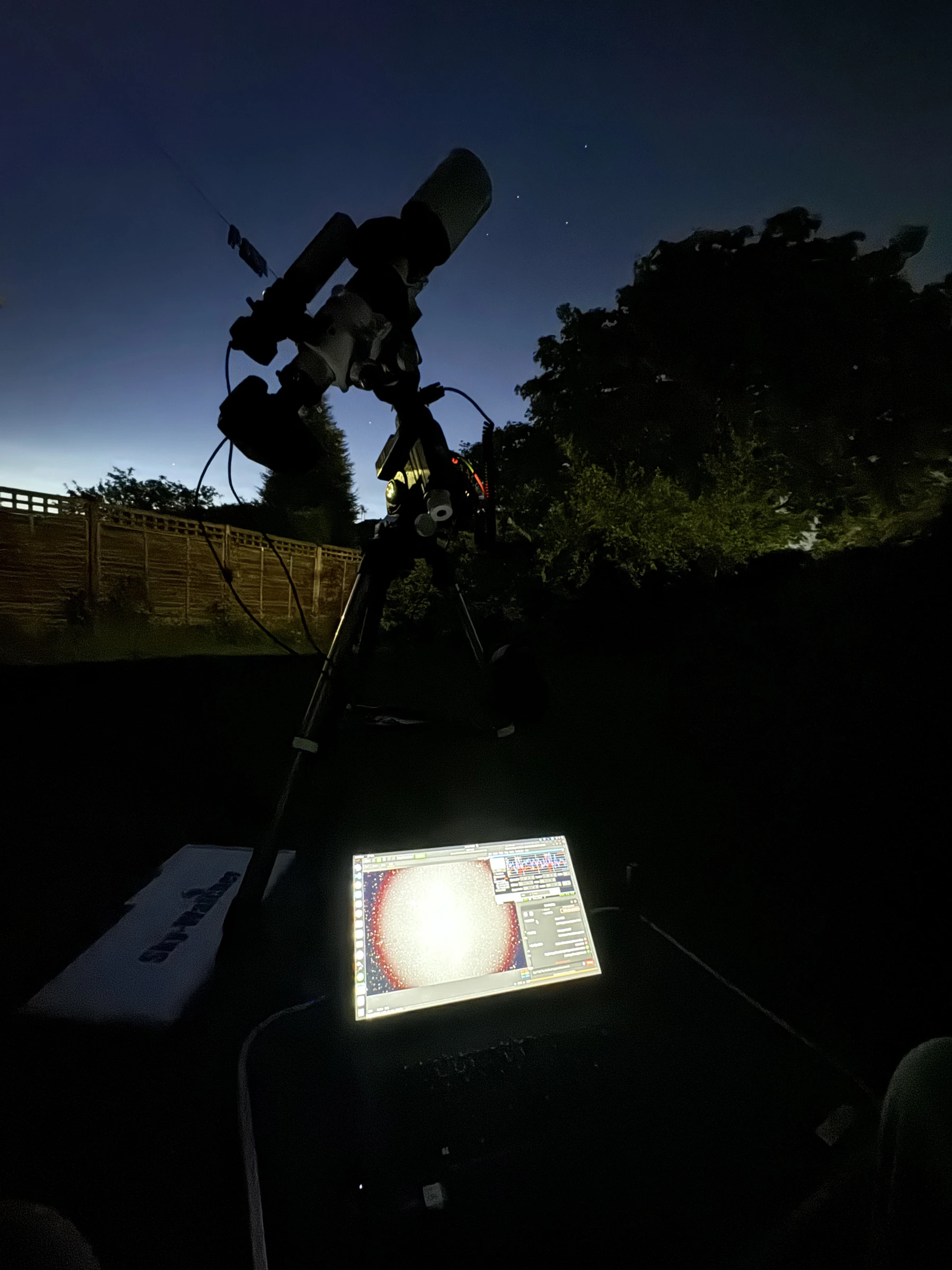 My astrophotography rig at the observing site. You can see just how light it was even past midnight from the glow on the horizon to the North.