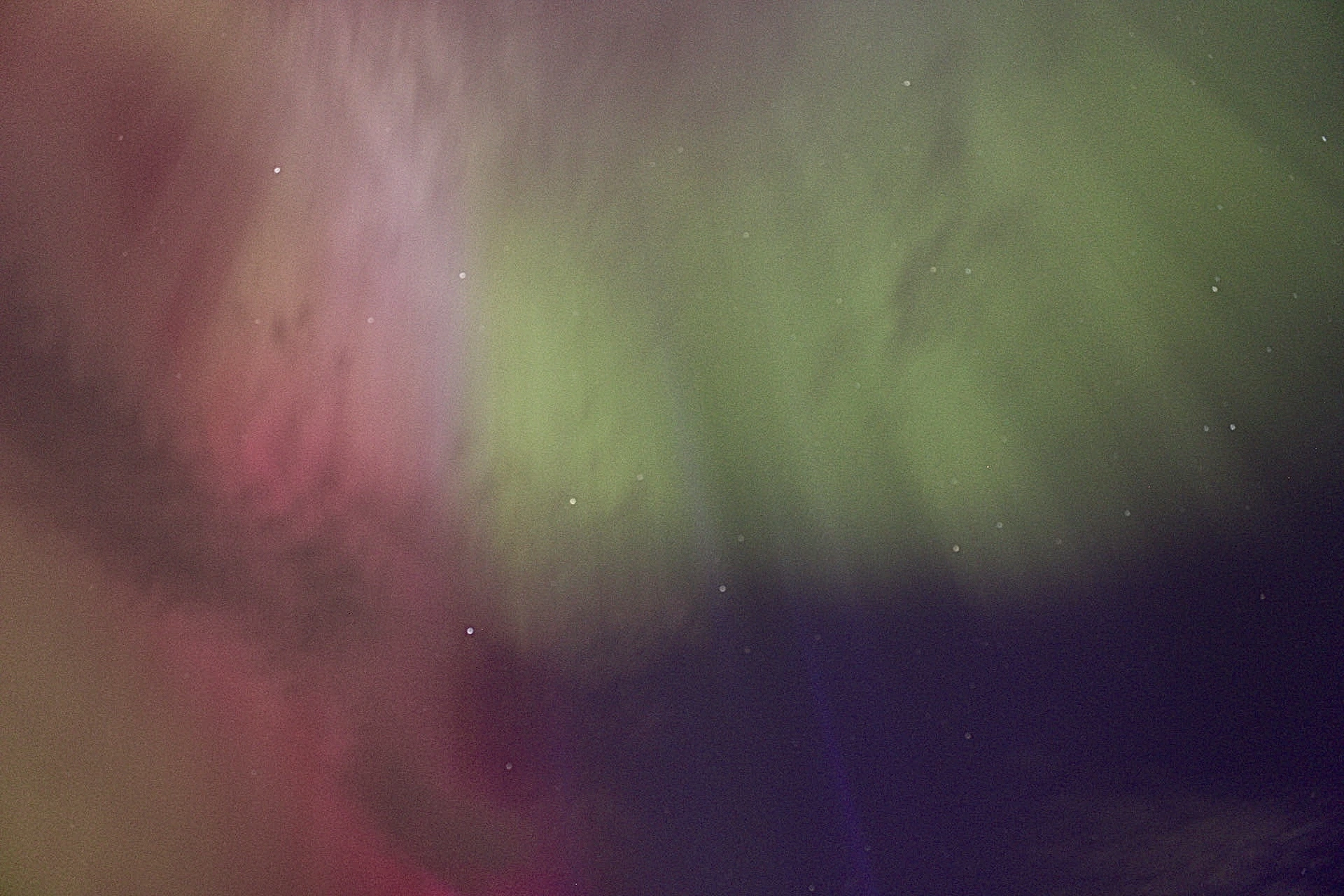 Looking up into the aurora. I love how (despite the noise and poor focus) you can clearly see individual rays of light in this image.